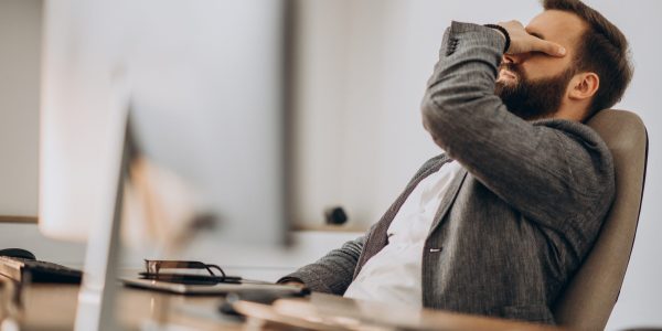 Handsome business man working at the desk